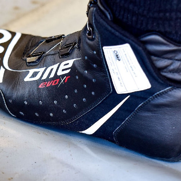 Driver Wearing a OMP One Evo X R Rotor Lacing Racing Shoes - Fast Racer
