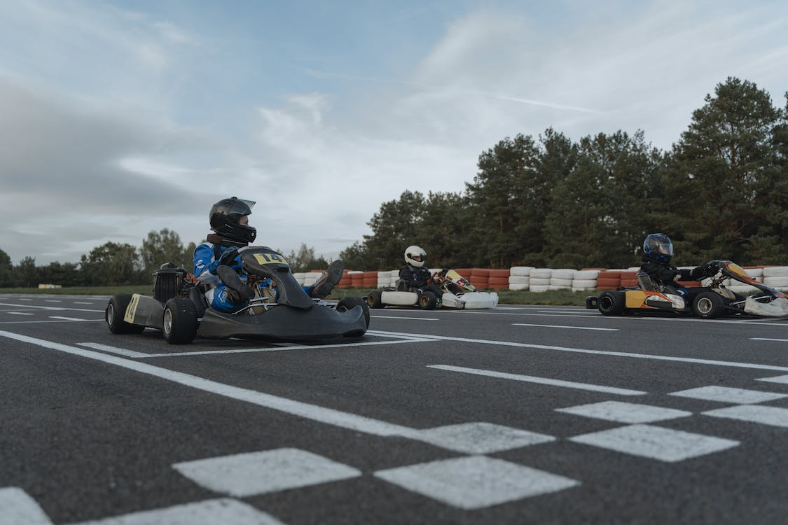 Beginner karting racers on a track