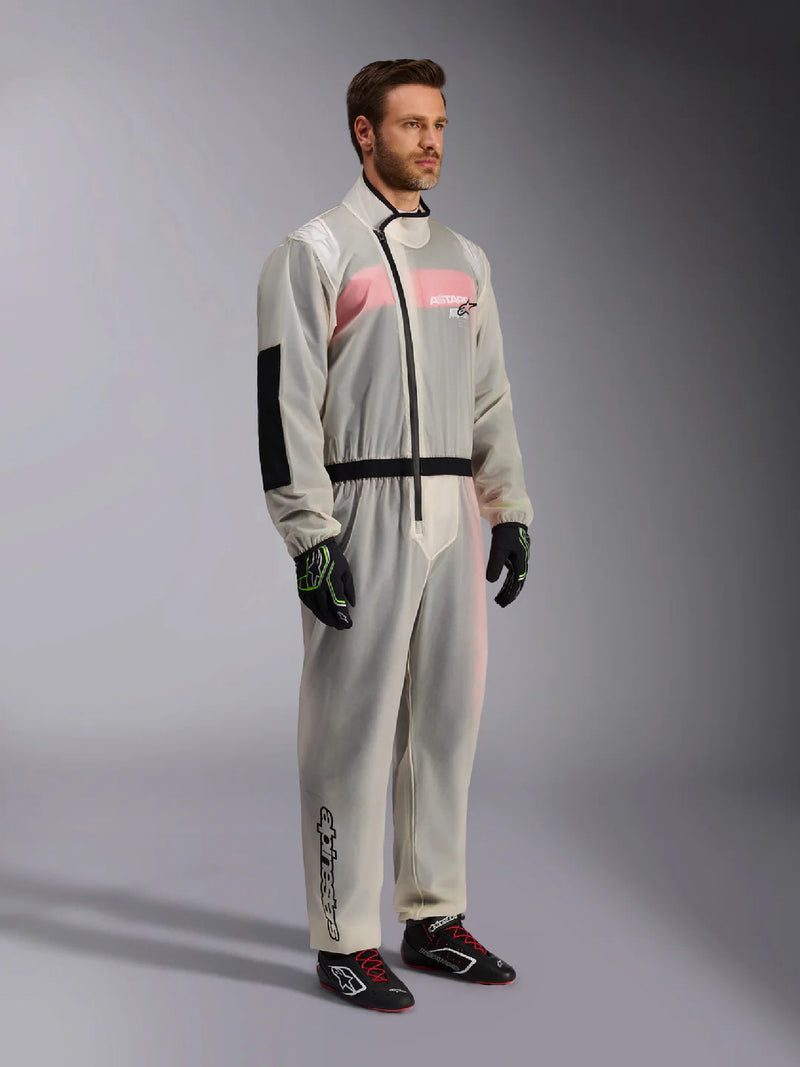 Side Right View of a Driver wearing the Alpinestars KART RAIN Suit - FAST RACER