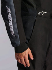 Close Up Arm view of a driver wearing the Alpinestars KMX-5 V3 Kart Suit in Black Color at FAST RACER