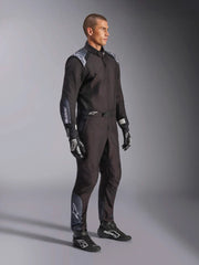 Side Right view of a driver wearing the Alpinestars KMX-5 V3 Kart Suit in Black Color at FAST RACER