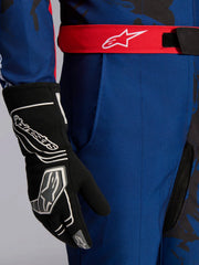Close Up arm view of a driver wearing the Alpinestars KMX-9 V3 Graphic 5 Kart Suit in Navy Blue/Red color at FAST RACER