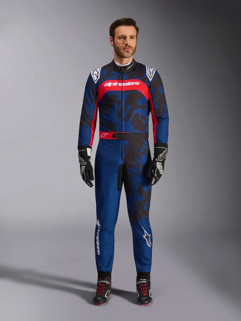 Full Front view of a driver wearing the Alpinestars KMX-9 V3 Graphic 5 Kart Suit in Navy Blue/Red color at FAST RACER