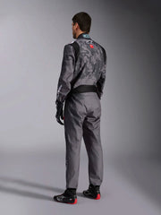 Side Back view of a driver wearing the Alpinestars KMX-9 V3 Graphic 5 Kart Suit in Dark Gray/Black color at FAST RACER