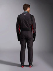 Full back view of a driver wearing the Alpinestars KMX-9 V3 Graphic 3 Kart Suit in Black/Red color at FAST RACER