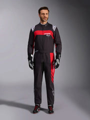 Full Front view of a driver wearing the Alpinestars KMX-9 V3 Graphic 3 Kart Suit in Black/Red color at FAST RACER