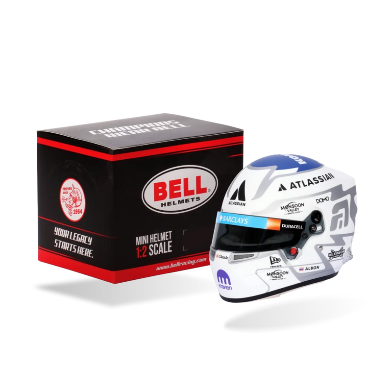 Alex Albon 2026 F1 Bell 1:2 scale mini helmet displayed beside its Bell presentation box - Fast Racer