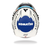 Top view of Alex Albon’s 2026 F1 Bell mini helmet with Komatsu, Atlassian, and blue-and-white graphics - Fast Racer