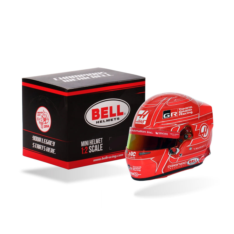 Front three-quarter view of Esteban Ocon's 2026 Haas F1 Bell 1:2 scale mini helmet with Bell retail box - FAST RACER