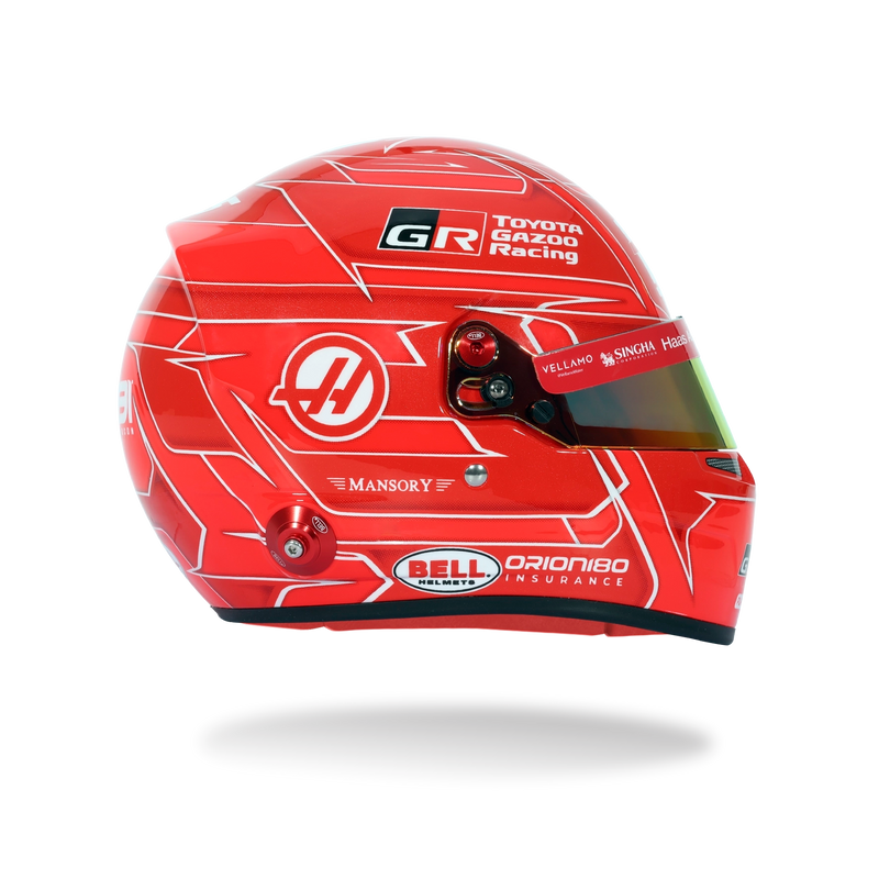 Rear view of Esteban Ocon’s red 2026 F1 Bell mini helmet with Haas, Esteban Ocon, Toyota Gazoo Racing, and Bell branding - Fast Racer