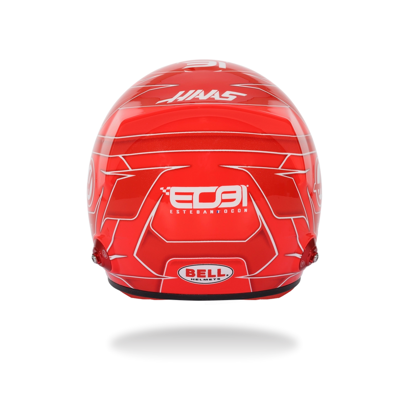 Top view of Esteban Ocon’s red 2026 F1 Bell mini helmet featuring the number 31, Haas, and Toyota Gazoo Racing graphics - Fast Racer