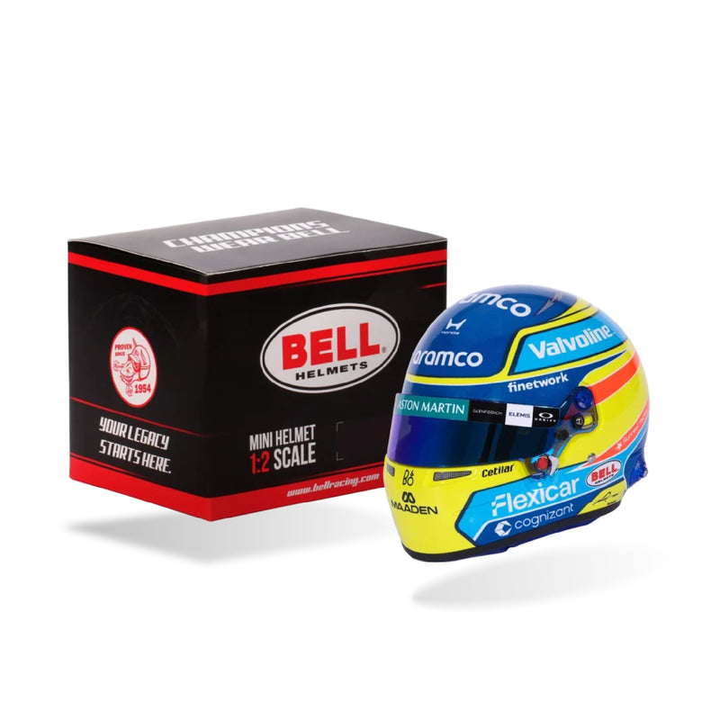 Front three-quarter view of Fernando Alonso's 2026 Aston Martin F1 Bell 1:2 scale mini helmet with Bell retail box - FAST RACER