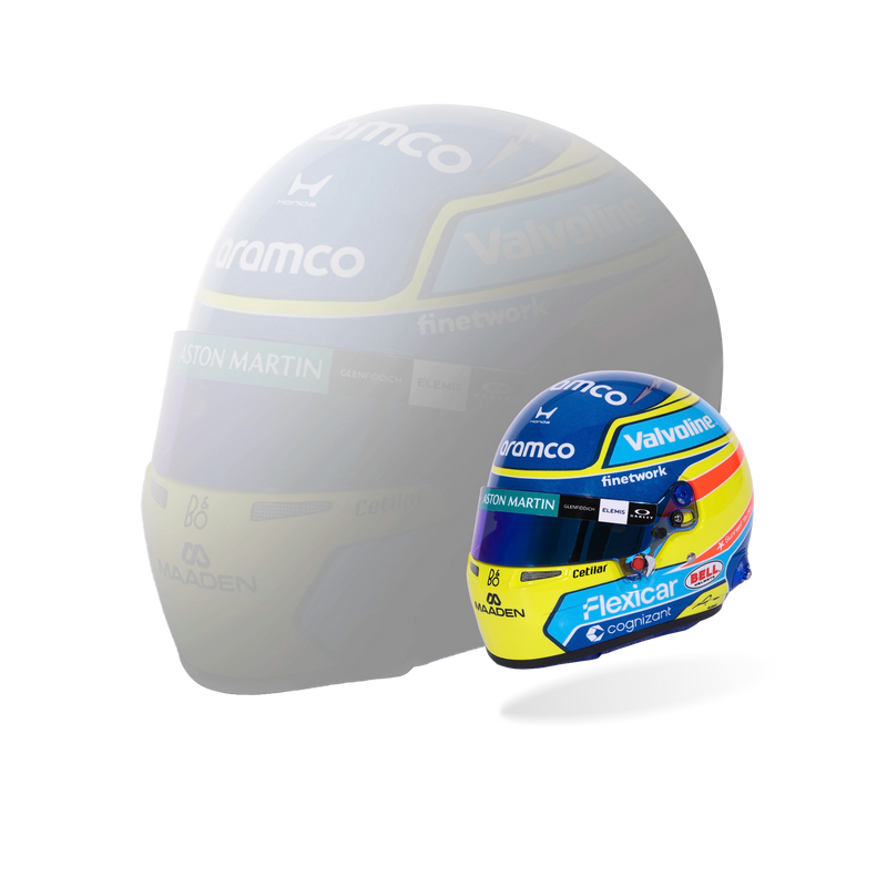 Front three-quarter view of Fernando Alonso’s blue and yellow 2026 F1 Bell mini helmet with Aston Martin sponsor graphics - Fast Racer