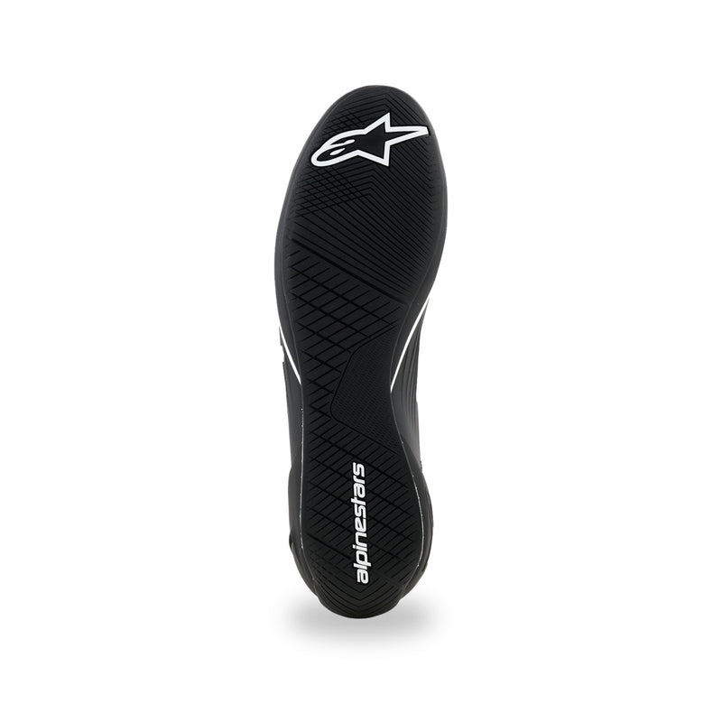 Alpinestars Supertech K karting shoe in Black/White, black rubber outsole with asymmetric tread and white logos