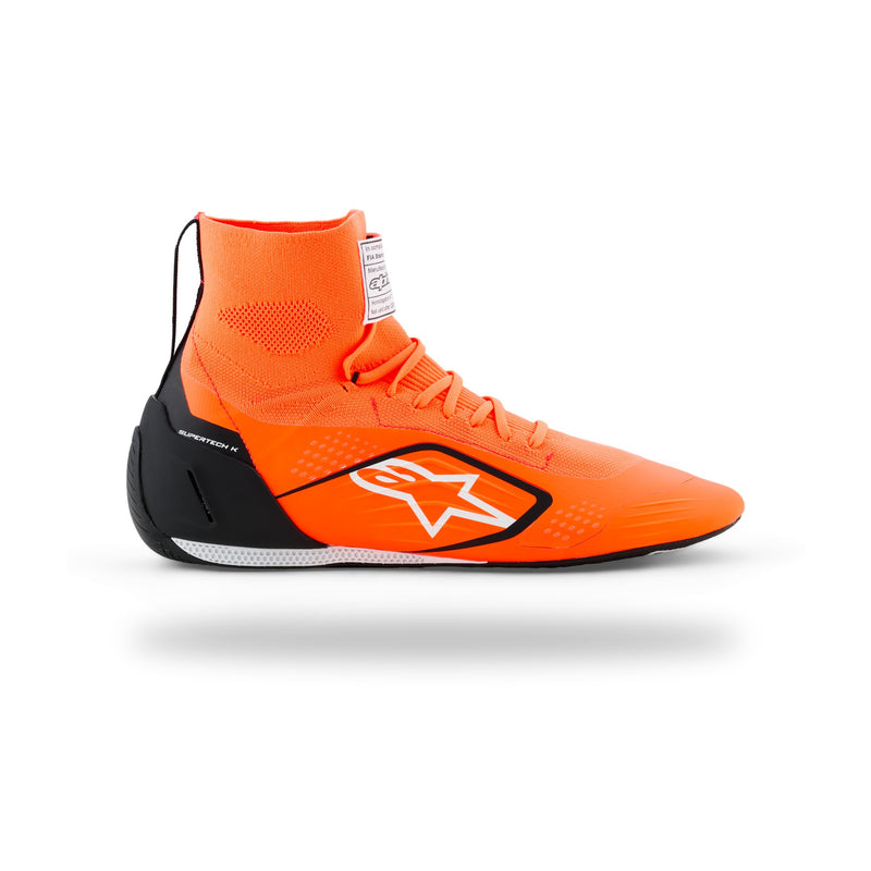 Alpinestars Supertech K karting shoe in Orange Fluo/Black/White, left side view with white star logo and black heel counter