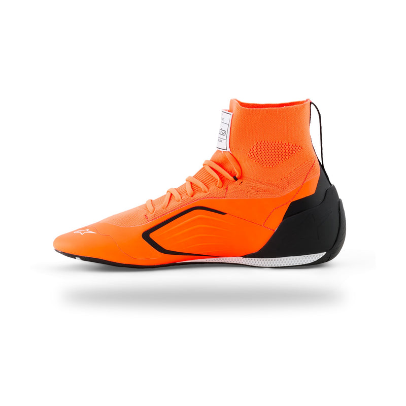 Alpinestars Supertech K karting shoe in Orange Fluo/Black/White, right side view of knitted upper and black heel counter
