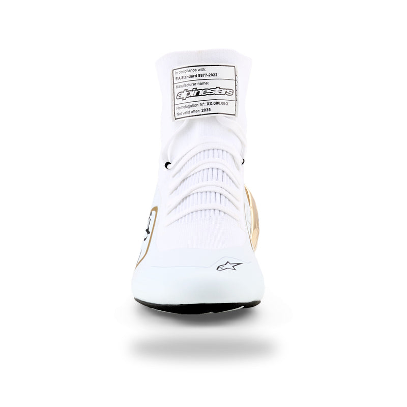 Alpinestars Supertech K karting shoe in White/Black/Gold, front view with white laces and FIA label on tongue