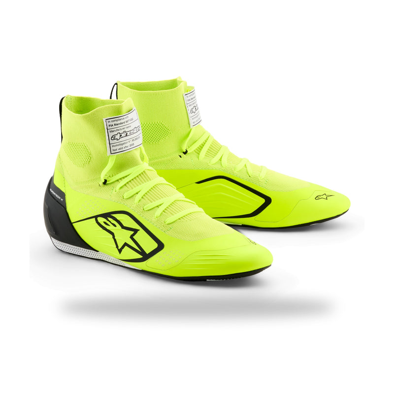 Alpinestars Supertech K karting shoe in Yellow Fluo/Black/White, three-quarter view with black star logo and FIA label