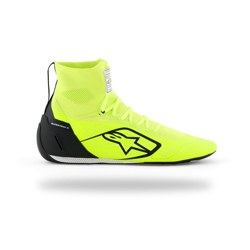 Alpinestars Supertech K karting shoe in Yellow Fluo/Black/White, left side view with black star logo and black heel counter