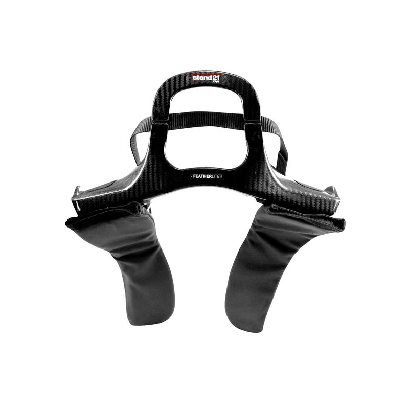 Stand21 FHR Featherlite Carbon restraint showing its curved rear profile and shoulder padding – Fast Racer